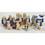 A collection of fourteen 19thc Staffordshire novelty figure pepperettes and salt sellers, some in