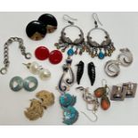 A mixed lot of costume jewellery comprising mainly earrings, some marked 925/Sterling silver, and