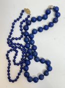 A lapis lazuli bead necklace with magnetic ball clasp fastening (21cm x 1cm) and a lapis lazuli bead