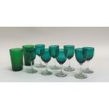 A set of eight Victorian green clear cut wine glasses (h- 13cm) together with two emerald green