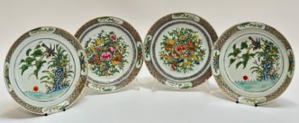 A pair of Qing Dynasty famille verte dishes depicting birds and flowers/pine tress in polychrome