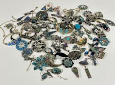 A large collection of white metal and silver jewellery mounted with abalone shell including