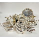 A collection of Epns including an Edwardian three piece engraved tea set and similar two piece