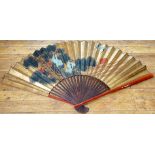 A large Japanese Rinpa style folding fan decorated with hand-painted scene of cranes, pine trees and