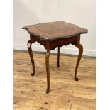 An early 20th century mahogany occasional table, the top with ebonised moulded edge of serpentine