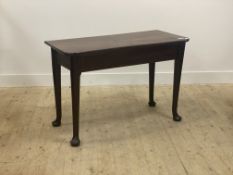 A George III mahogany side table, the plain top raised on turned supports with pad feet H73cm,
