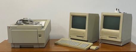 A Macintosh SE personal computer with keyboard and mouse, a Macintosh SE/30 moniter, a Vintage Apple