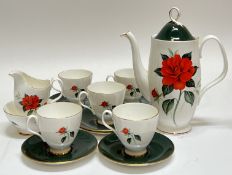 A Royal Albert 'Tahiti' part coffee set decorated with flowers and gilt comprising a coffee pot (