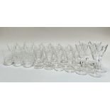 A mixed group of cut crystal drinking glasses comprising six matching tumblers (h- 9cm), twenty