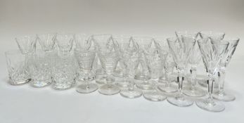 A mixed group of cut crystal drinking glasses comprising six matching tumblers (h- 9cm), twenty