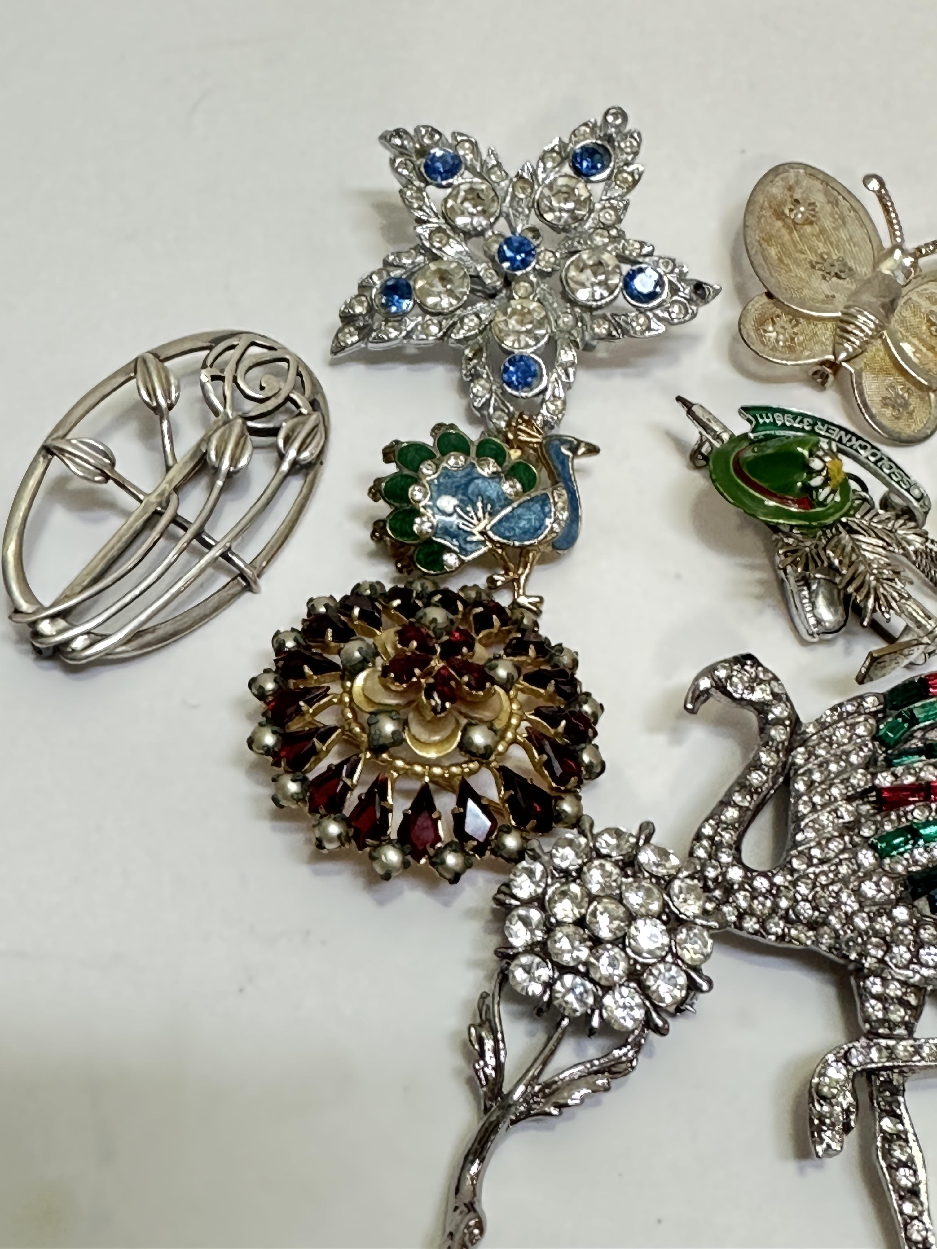 A collection of paste set brooches including a Cartier style Flamingo brooch, Peacock brooch, - Image 3 of 3