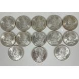 A collection of thirteen American 1885 Morgan O $1 silver coins in uncirculated condition. (13)