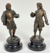 A pair of late 19thc spelter gilded standing figures of William Shakespeare, holding a book and