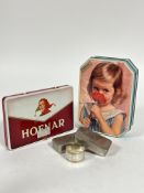 A vintage Cremona octagonal toffee tin (4cm x 20cm) and a Dutch Hofnar cigarette box (2cm x 18cm),