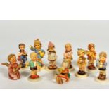 A collection of ten Hummel pottery figures including, From me to you, Pretty Please, Wait for Me