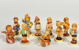 A collection of ten Hummel pottery figures including, From me to you, Pretty Please, Wait for Me