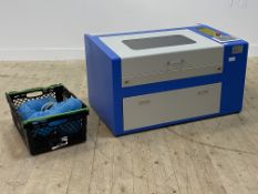 A CO2 laser engraving machine, 500mm x 300mm