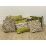 A group of five scatter cushions of various designs