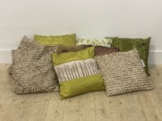 A group of five scatter cushions of various designs