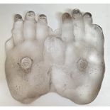 A textured art glass sculpture of two hands with impressed tablets reading 'Just say No', and '