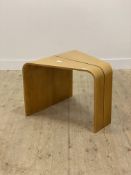 A contemporary bentwood birch ply end table H52cm, L62cm