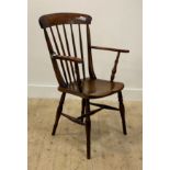 A Victorian ash and beech vernacular Windsor chair, with spindle back, saddle seat and turned