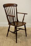 A Victorian ash and beech vernacular Windsor chair, with spindle back, saddle seat and turned