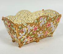 A Hungarian Zsolnay Pecs pierced basket of flared rectangular form with gilt bamboo style frame
