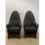 A pair of contemporary leather and sued upholstered high back chairs H119cm