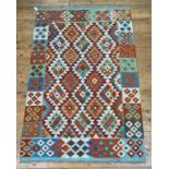 A Chobi kilim rug of overall geometric design, 190cm x 124cm