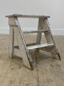 A painted pine three rung step stool, early 20th century, H43cm, W47cm, D41cm