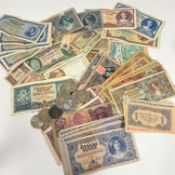 A collection of Hungarian bank notes from 1930-1946 of various denominations, including 500 Pengo,
