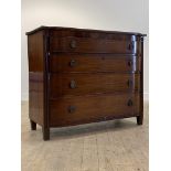 A Regency mahogany bow front chest of drawers, the four graduated drawers enclosed by reeded