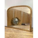 A Victorian (over painted) gilt framed over mantel mirror with rope twist moulding to arched frame