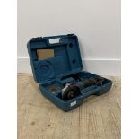A Makita corded angle grinder in hard case (untested)