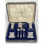 A cased Birmingham five piece condiment set of flared cylinder form with drum mustard with blue