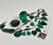 A collection of malachite including a carved bust (6cm), a circular pumpkin paperweight (5cm), heart