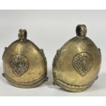 An Indian pair of temple style bells of lotus leaf shape, with loop to top and buteh shaped