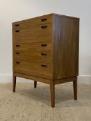 Alfred Cox, a mid century walnut chest fitted with five drawers, raised on square tapered supports