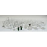 A large collection of various glassware comprising seven champagne glasses (h- 11cm), nine