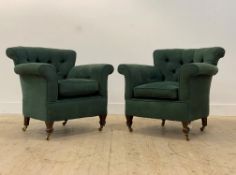 A pair Edwardian tub chairs, well upholstered in buttoned teal fabric, raised on square tapered