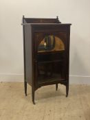 An Edwardian rosewood sheet music cabinet, the ledge back, top, case and glazed and mirrored door