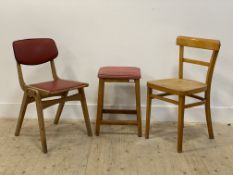 A mid century beech framed side chair with red vinyl upholstered back and seat (H76cm) together with