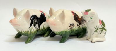 Two Wemyssware Griselda Hill pottery pigs painted with chickens/cocks and grass (marked verso 'G.