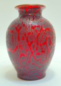 A Monart/Vasart style red textured glass 'cloisonne' vase of ovoid form with flared mouth