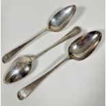 A set of three George III Edinburgh silver Old English pattern table spoons with engraved crest to
