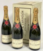 A box with three bottles of Moet & Chandon Brut Imperial Champagne circa 1990's. (3)
