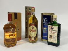 A bottle of Isle of Jura ten year old single malt whisky, a bottle of Grant's Family Reserve