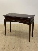 A Stag Minstrel mahogany console table fitted with single drawer raised on square tapered supports