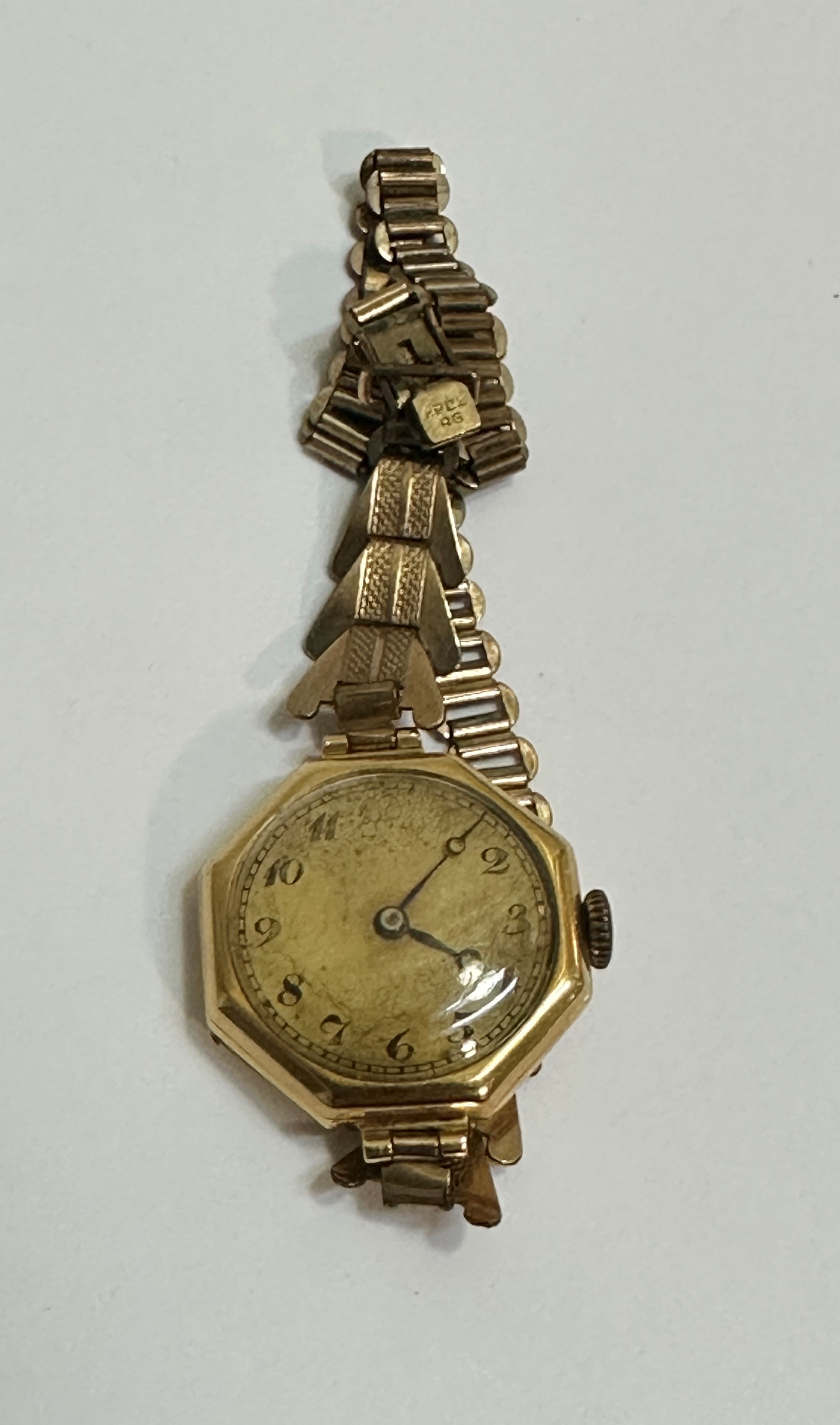 A Vintage lady's 1930's 18ct gold cased wrist watch with octagonal gilt dial on rolled gold